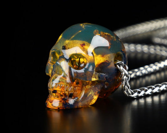 Gem Skull Pendant Necklace of Dominican Blue Amber Carved Skull