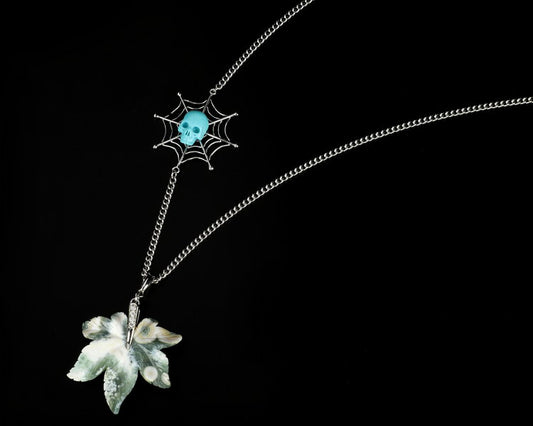 Gem Skull Pendant Necklace of Turquoise Carved Skull with Ocean Jasper Leaf in Blackened Sterling Silver