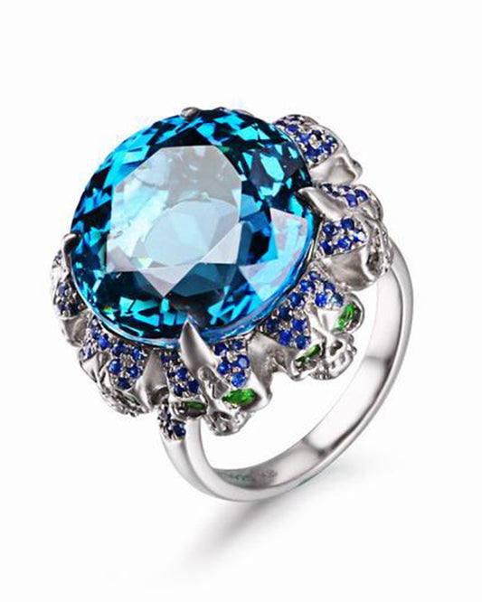 Circle of Fate - Gem Skull Ring of Round Cut Blue Topaz Carved with Skull Sapphire Skulls in 925 Sterling Silver