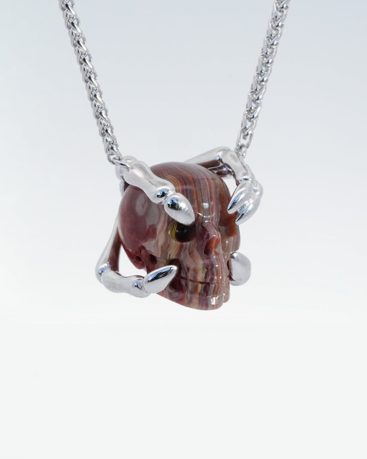 Gem Skull Pendant Necklace Of Red Crazy Lace Agate Carved Skull With Sterling Silver Finger