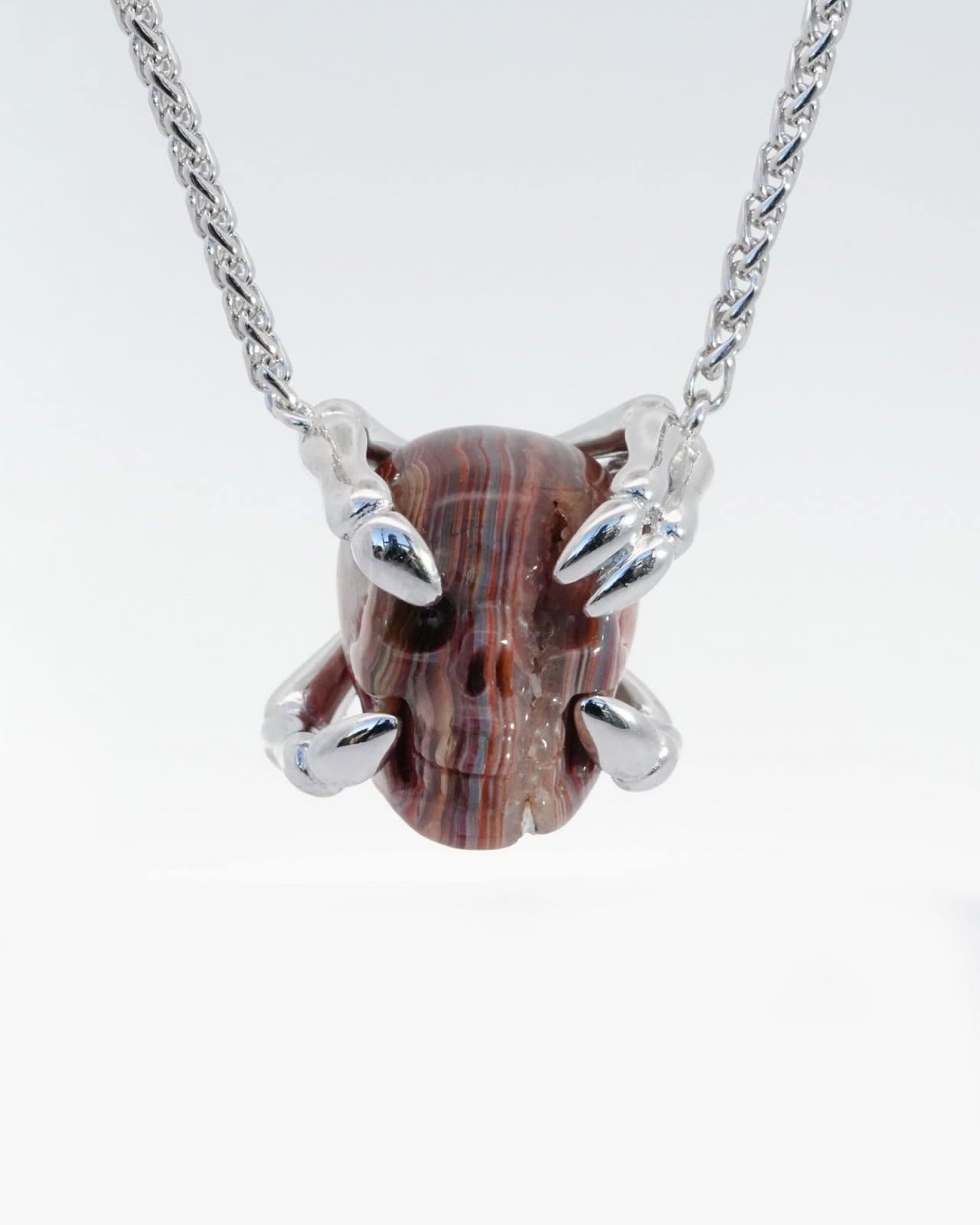 Gem Skull Pendant Necklace Of Red Crazy Lace Agate Carved Skull With Sterling Silver Finger