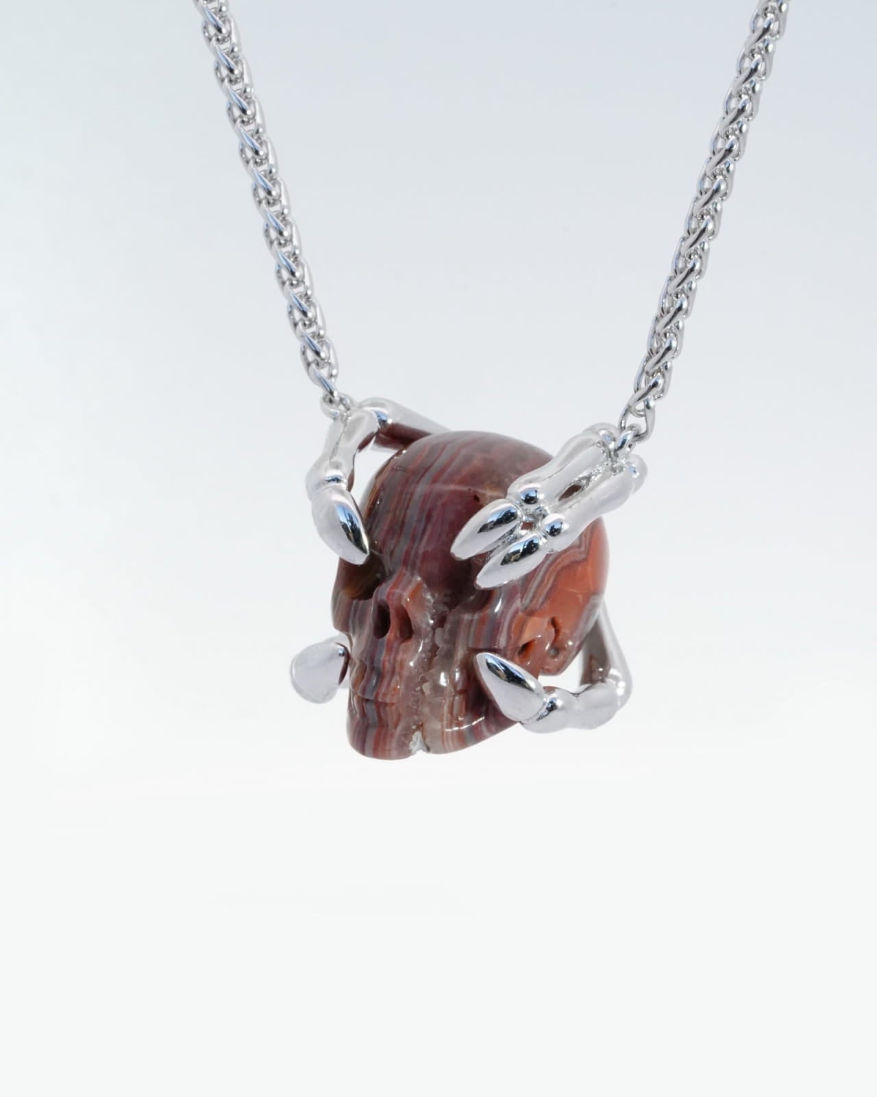 Gem Skull Pendant Necklace Of Red Crazy Lace Agate Carved Skull With Sterling Silver Finger