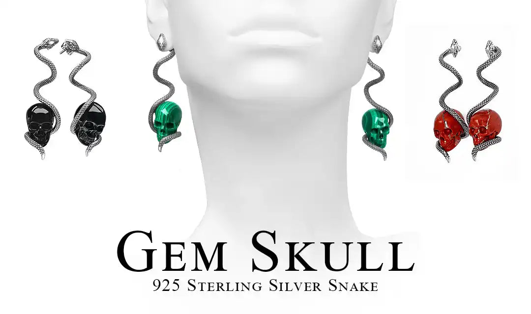 Sterling silver snake earrings with gem skulls.